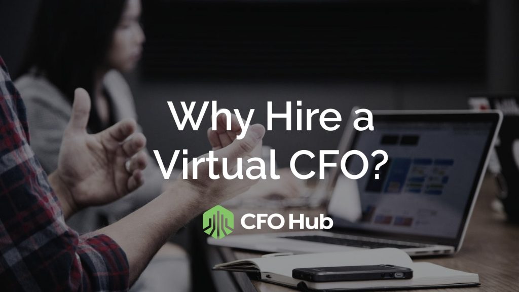 A presentation is underway in a conference room, highlighting the text "Why Hire a Virtual CFO?" prominently on the screen. Beneath the text, the "CRI CFO Hub" logo is visible. Attendees are seated at a table with laptops and devices, poised to learn about the benefits of hiring a Virtual CFO.